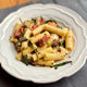 Image for article titled Surprise yourself with a hodgepodge sausage pasta
